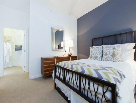 Bedroom with walk-in closet