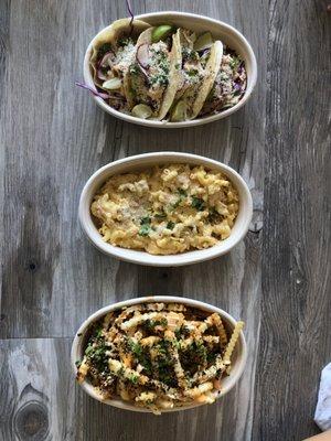 Fish tacos, lobster Mac n cheese and poke fries