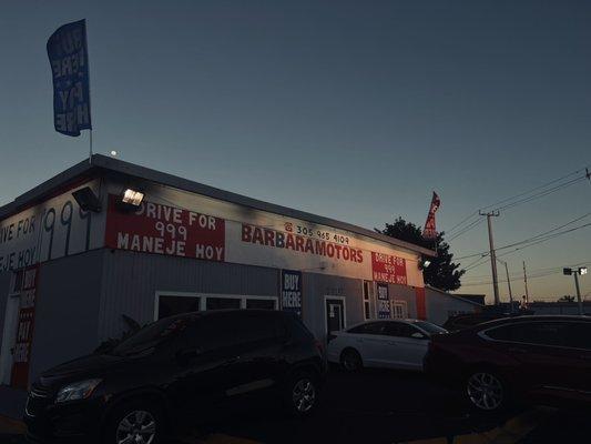 Front of store at night