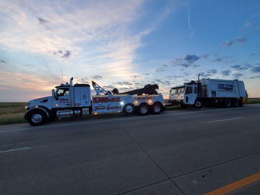 Sanitation trucks, no problem, we can safely tow them for you, no problem.