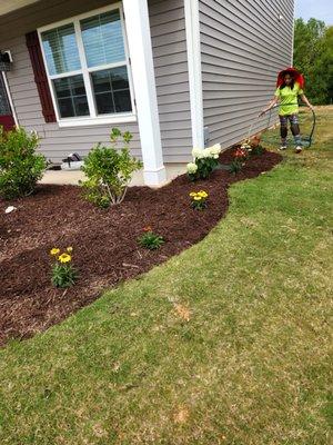 Great job creating new
Flower bed.