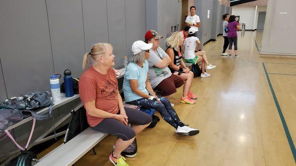 Players waiting their turn to play.