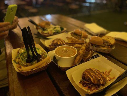 Crabcakes, next level grilled cheese with tomato , brisket sliders, pork belly sliders, poutine fries with egg on top