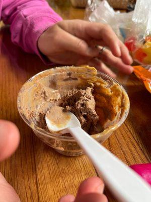 Peanut butter topping on chocolate ice cream