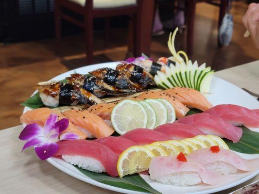 Smoked Salmon, Unagi, Mebachi, and Hamachi Nigiri.