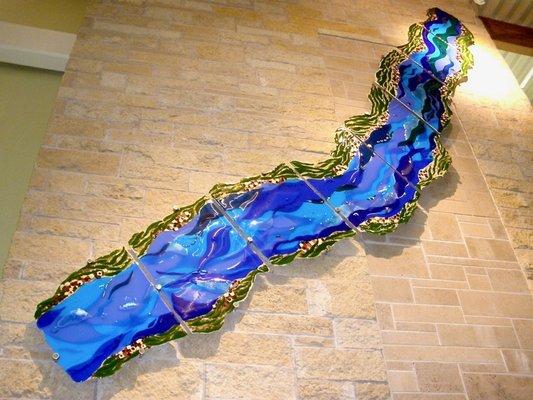 "River Fusion", 20' tall fused glass wall sculpture, UWRF Student Center