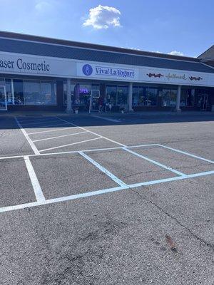 Entrance in a strip mall by Kroger