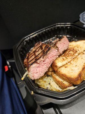 Steak and eggs cooked oerfect medium