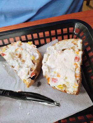 Sun dried tomato bagel with vegetable cream cheese