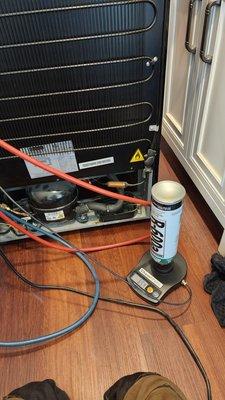 Refrigerator repair, freon filling