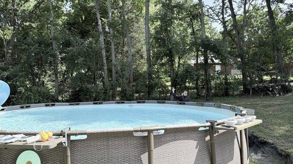 Pool damage showing entire side across the far side of pool damaged