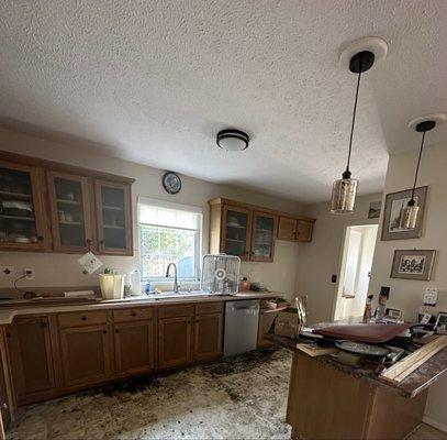 Before with tile pulled, wall in place, lighting