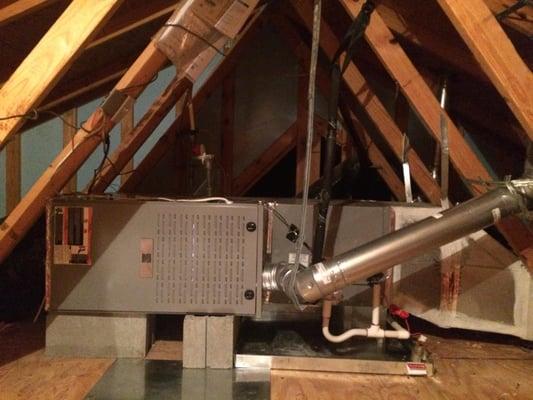 Here is a furnace in attic. We changed furnace and added new drain pan under coil. You can see where we sealed the ductwork t...