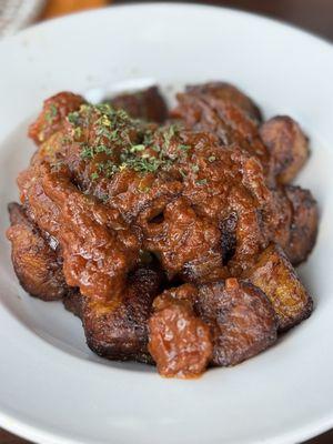 Plantain with tomato sauce