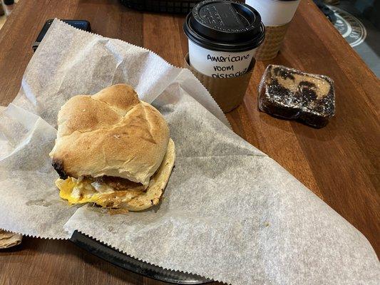 Americano coffee with pistachio flavor, banana chocolate bread and I think the colebrook breakfast sandwich
