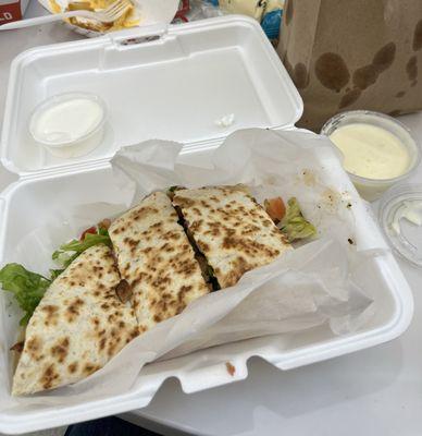 Steak Quesadilla with lettuce, tomato & sour cream.