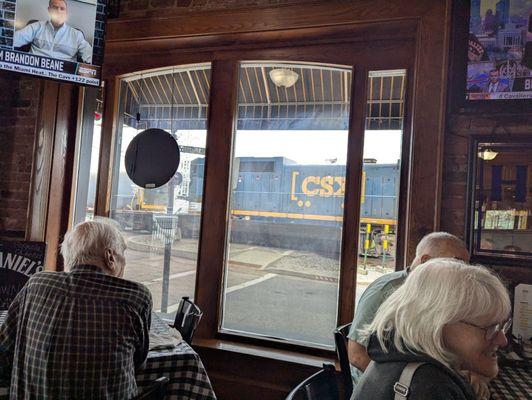 Train going by while we ate.