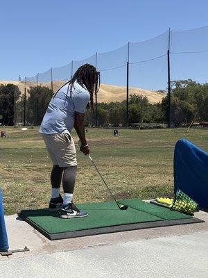 Range practice before round