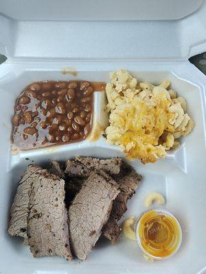 Chewy brisket with some disgusting mustard sauce, bland mac and cheese, beans were decent, way over priced was $30 for the small portion.