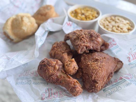 4 piece dark chicken, fresh bread rolls, mac & cheese, and kernel corns.