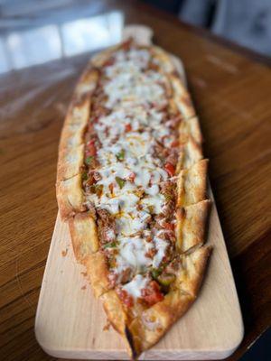 Beef strips, mozarella,tomato,red onion