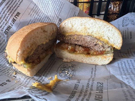 1/3 Cheese Burger w/pickles, raw onion, mustard and ketchup.