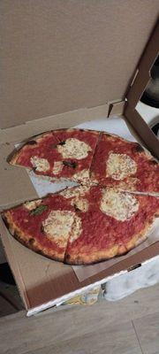 This is supposed to be a Margherita pizza for $30 bucks. Pathetic! Don't waste your hard earned money at this place