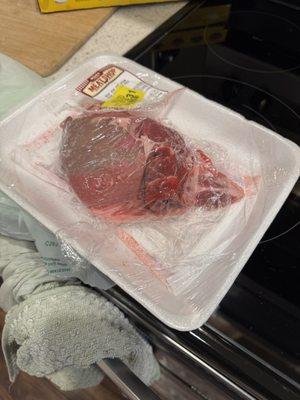 Grey slimy meat hidden underneath a good steak.