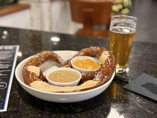 Bavarian pretzel with both sauces. Huge and perfectly baked. Be careful, it's served pipping hot, as you'd want it to be.