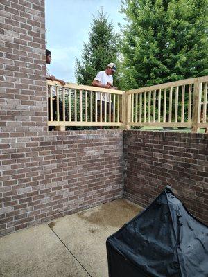 Handrail added at top of walk-up patio.
