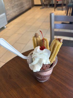 Açaí and strawberry ice cream with Dulce de lech Churros