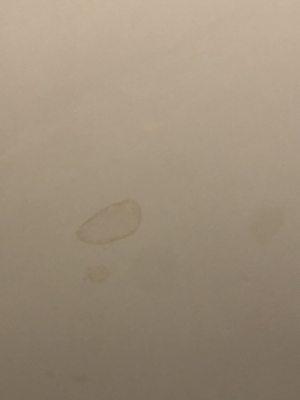 Ceiling Water stain caused by Smart Roof incorrectly reassembling HVAC exhaust pipe in attic