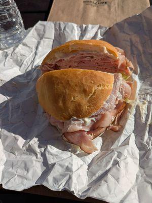 Delicious ham and Swiss cold sandwich (as opposed to a panini)