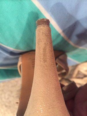 The scrape that was not there when I brought the shoes in!