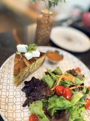 Tortilla Española - omelette loaded with veggies served with side salad w/mango vinaigrette - delicious