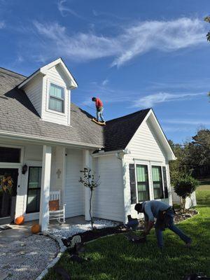Wade Roofing, LLC doing a repair for wind damaged shingles