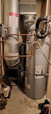 We had to remove water heater to get water source heat pump behind it