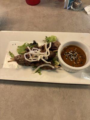 Beef skewer app with Thai peanut sauce