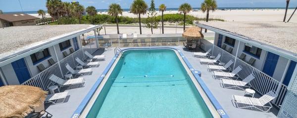 Enjoy a swim in our heated pool overlooking the beach off the Gulf of Mexico