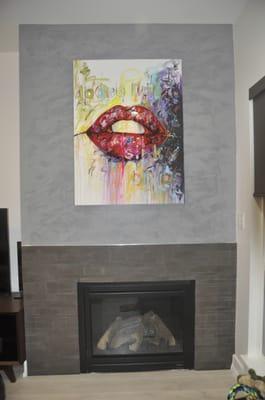 Crooked fireplace. One side is 18" long and the other is 13" long (the painting is centered on the wall). Refusing to repair.