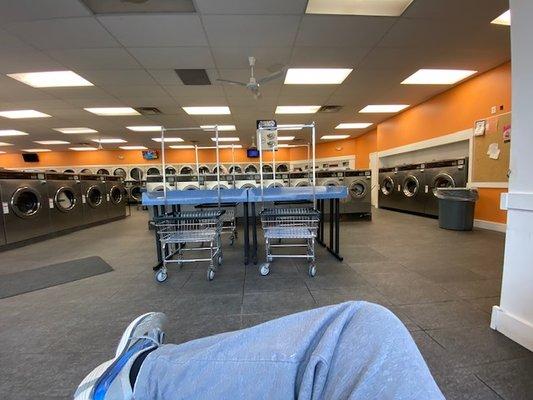 Seating available to wait. Clean area. Plenty of working machines.