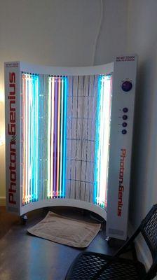 The Photon Genius is 7 feet tall and 5 feet wide simi circle. You sit or stand in front of the Photon Genius.