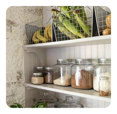 Produce up top; staples decanted in jars below--fresh, visible, and tidy.