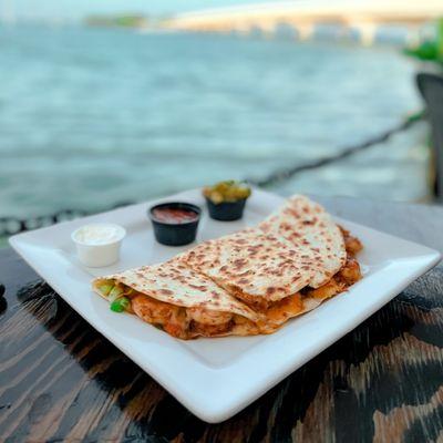 We like to keep our quesadillas right where we can enjoy them... and that's at a waterfront table
