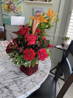 Upgraded bouquet with a nice variety of flowers.