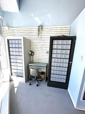 Private Mailboxes with a desk to check mail