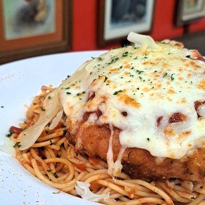 Chicken Parmesan over a bed of spaghetti with our new Marinara Sauce
comes with a side salad for $13.95