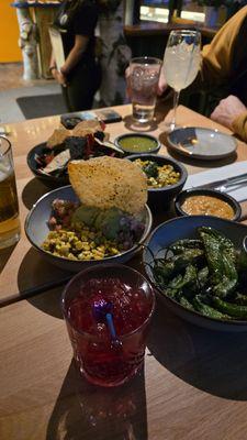 Guacamole, shishito peppers, salsa, elote, drinks.