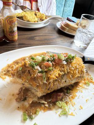 Breakfast burrito with skillet in background