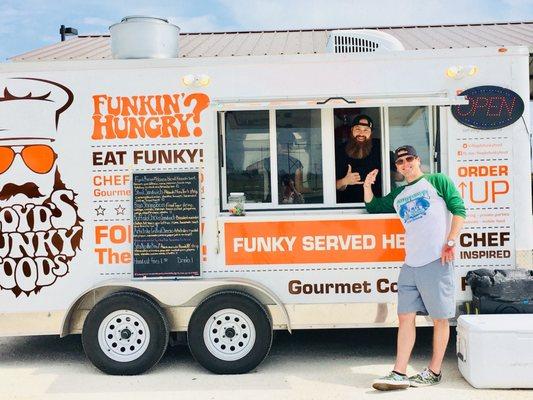 My husband, with the owner, Trey!